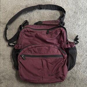 Purple and Black Travel Bag with Adjustable Strap and Durable Design